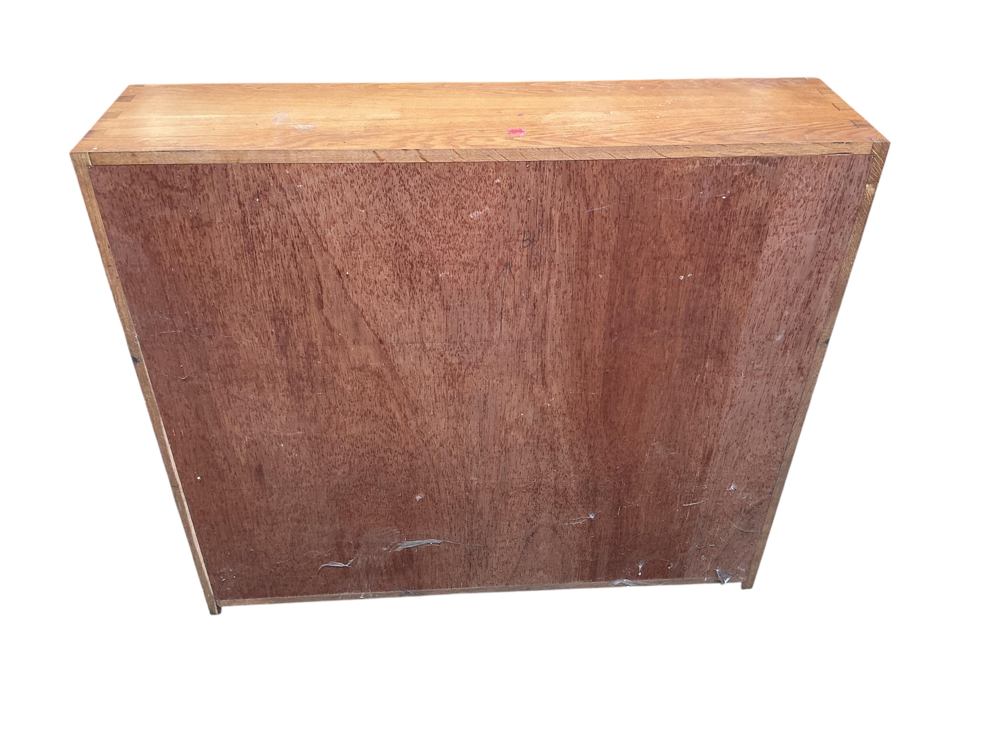 A pair of bespoke oak open bookcases, each width 132cm, depth 30cm, height 107cm